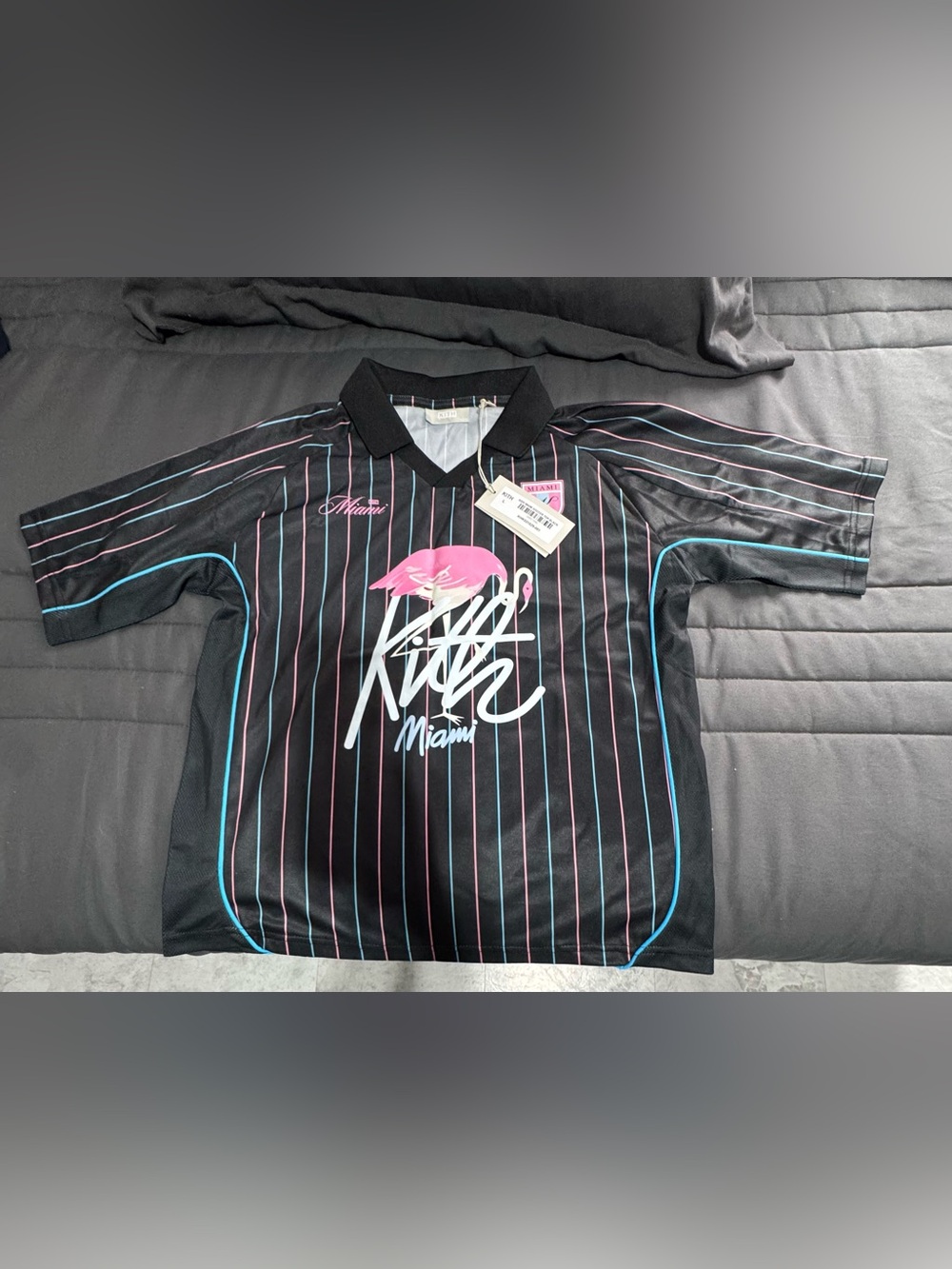 Kith Black Polo Shirt with Pink & Teal Accents